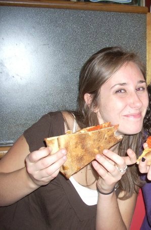 Ashley eating pizza