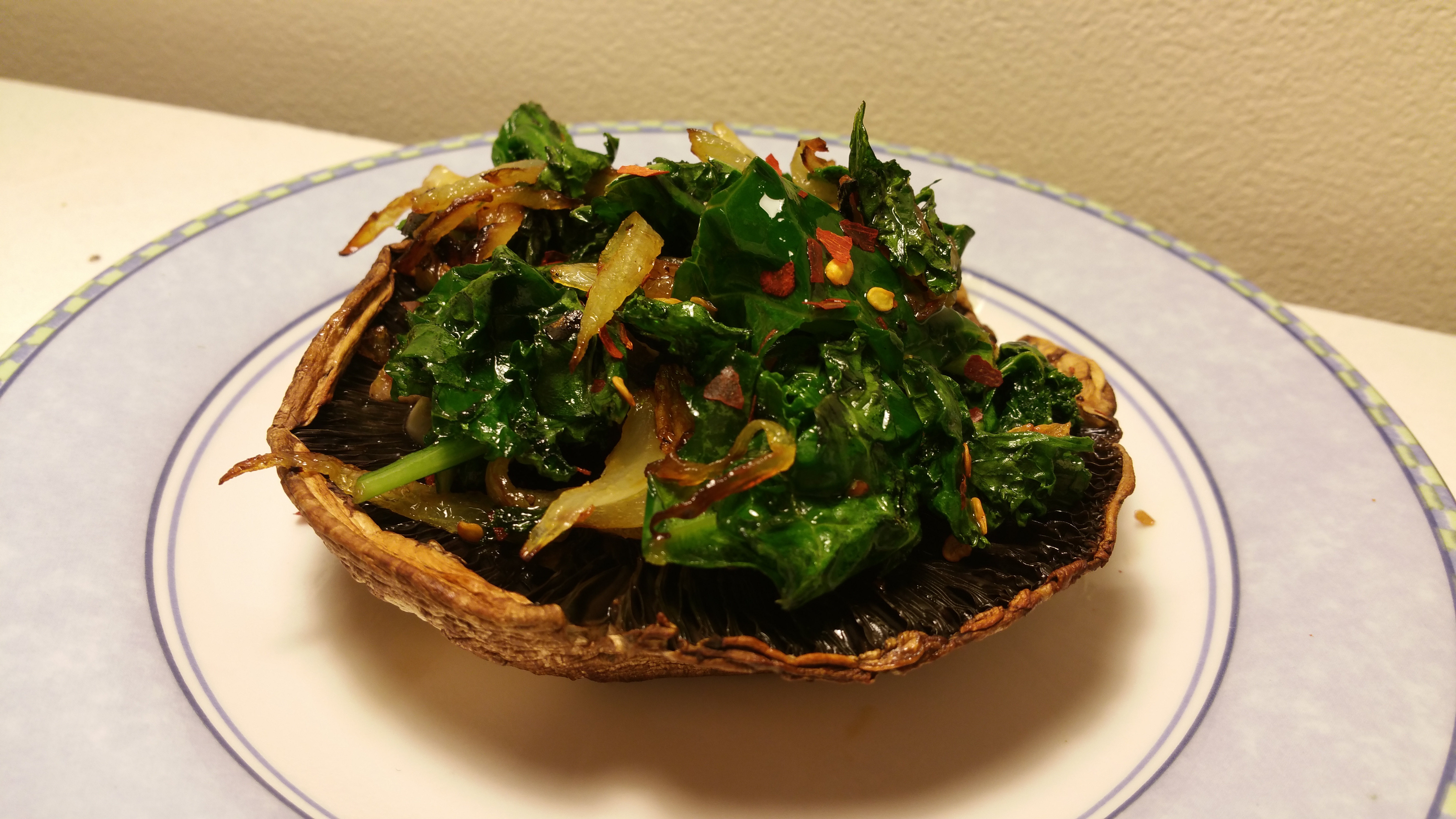 portabella mushroom with kale and onions